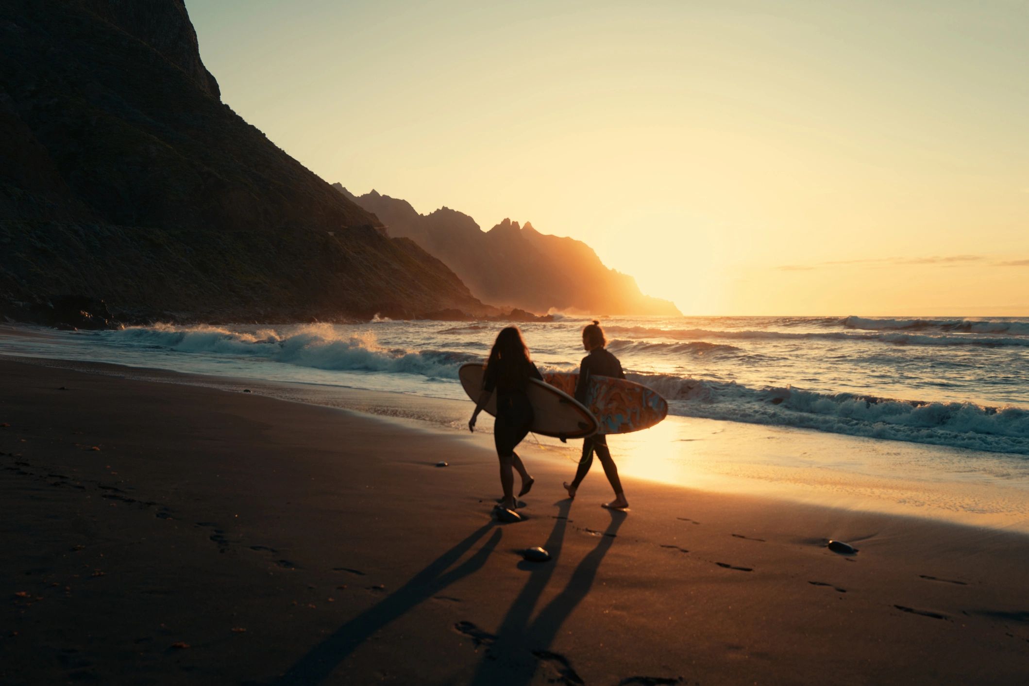 Beach engagement at sunset